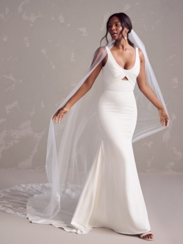 How to bedazzle your guests minus the sparkle? Opt for timeless grace and charm of a simple wedding dress with keyhole bodice made from an exceptionally comfortable satin. Also available with filled in bodice, Ivory only. Sizes UK2-UK30