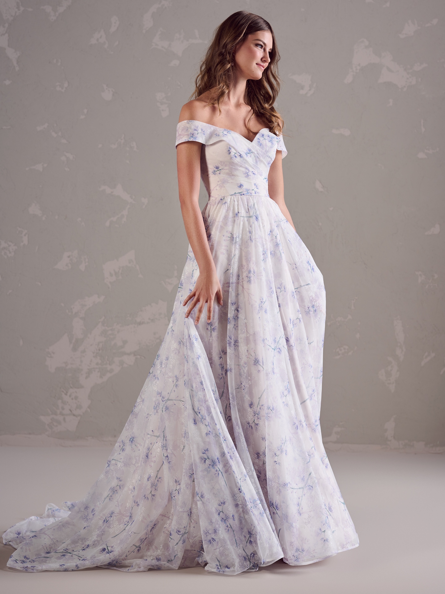 'Boho Luxe' starts with an irresistible silhouette and unexpected flourish. This blue floral wedding dress has both these bases covered-and more. Available in Blue Floral only and sizes UK2-UK30