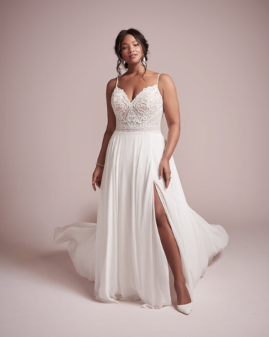 Soft and dreamy, this dress makes a statement with it's V neck bodice and slinky cool skirt-perfect for all weathers. Available in ivory over Nude Illusion and sizes UK2-UK30